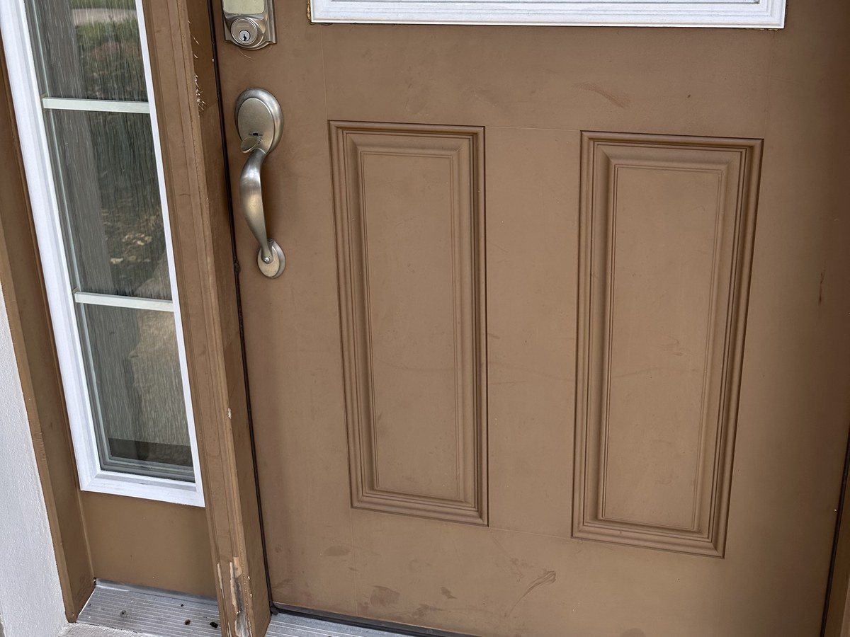 Front entry door before restoration